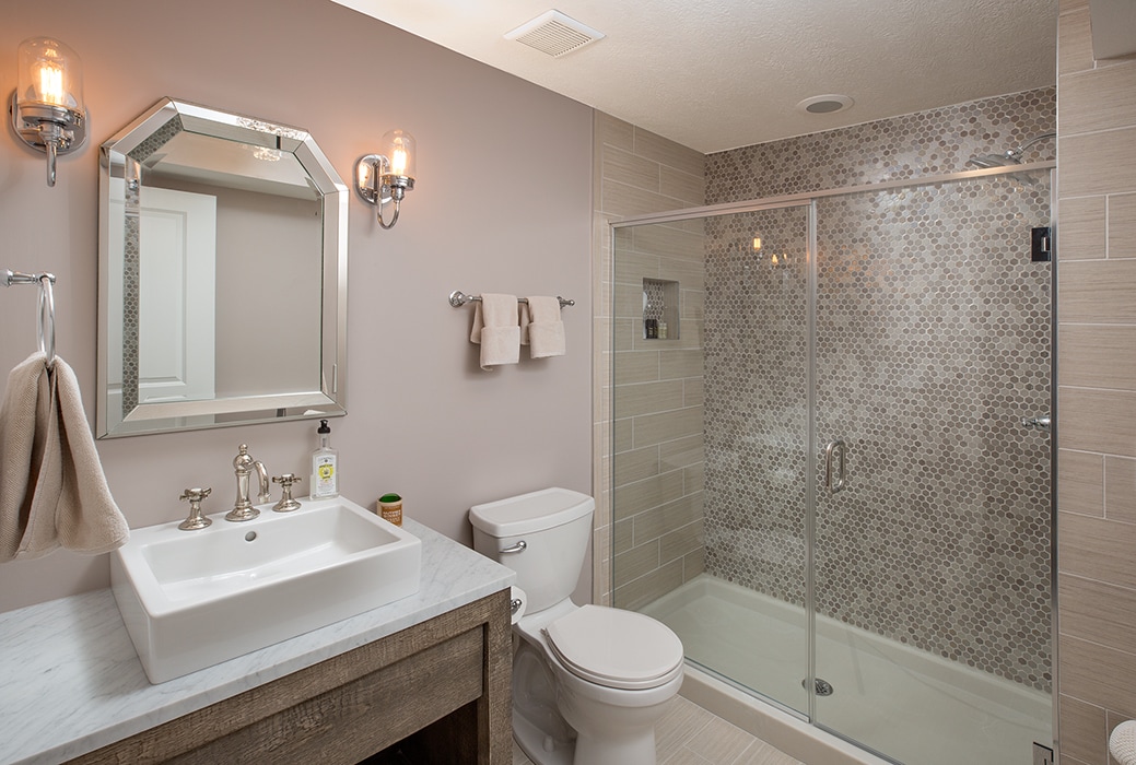 A full bathroom in a basement renovation.