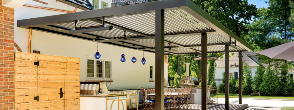 Unique Motorized Pergola Keeps Luxurious Outdoor Kitchen Comfortable